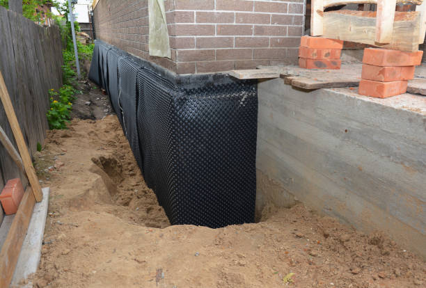 Happy homeowners after waterproofing job in Bound Brook
